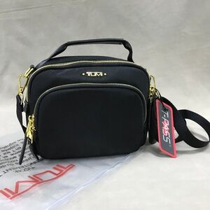 Tumi Black Crossbody Bag with Gold Details